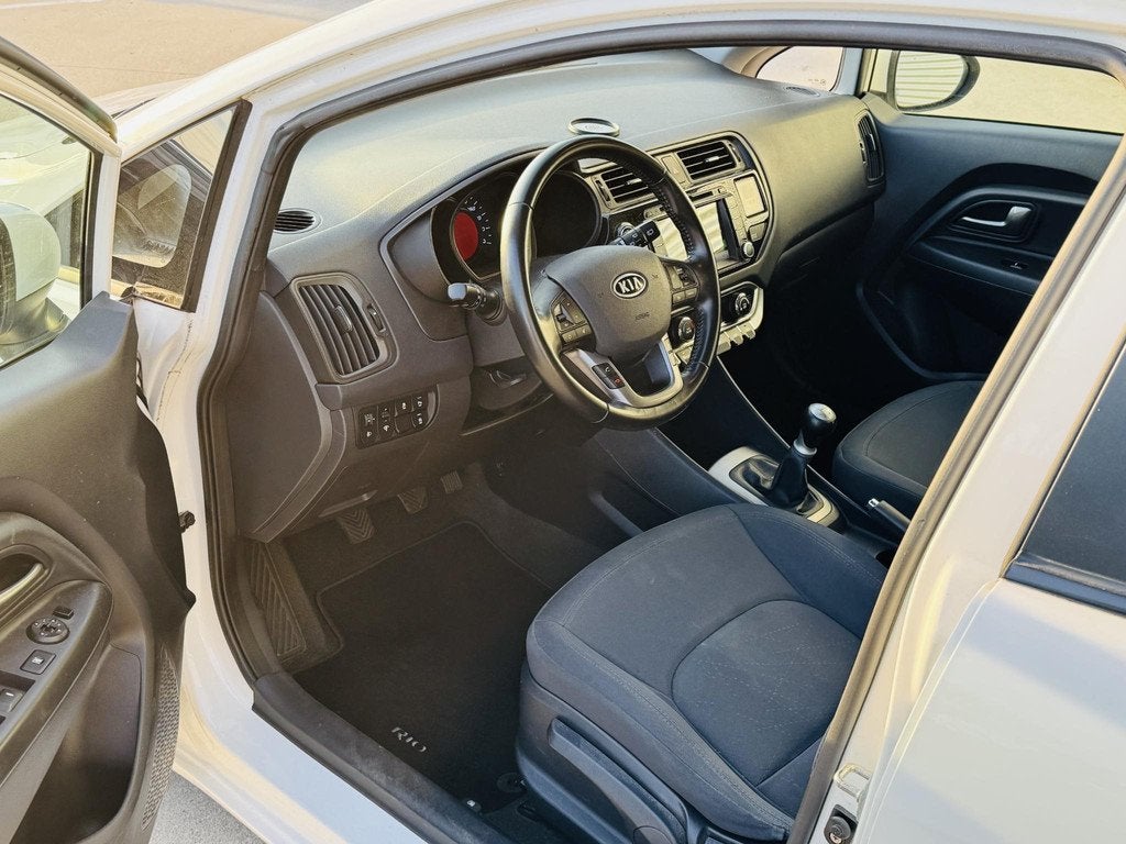 Kia Rio 1.2 SuperPack 85pk Clima | Cruise |Keyless | PDC & A, Auto's, Kia, Euro 5, 4 cilinders, Wit, Origineel Nederlands