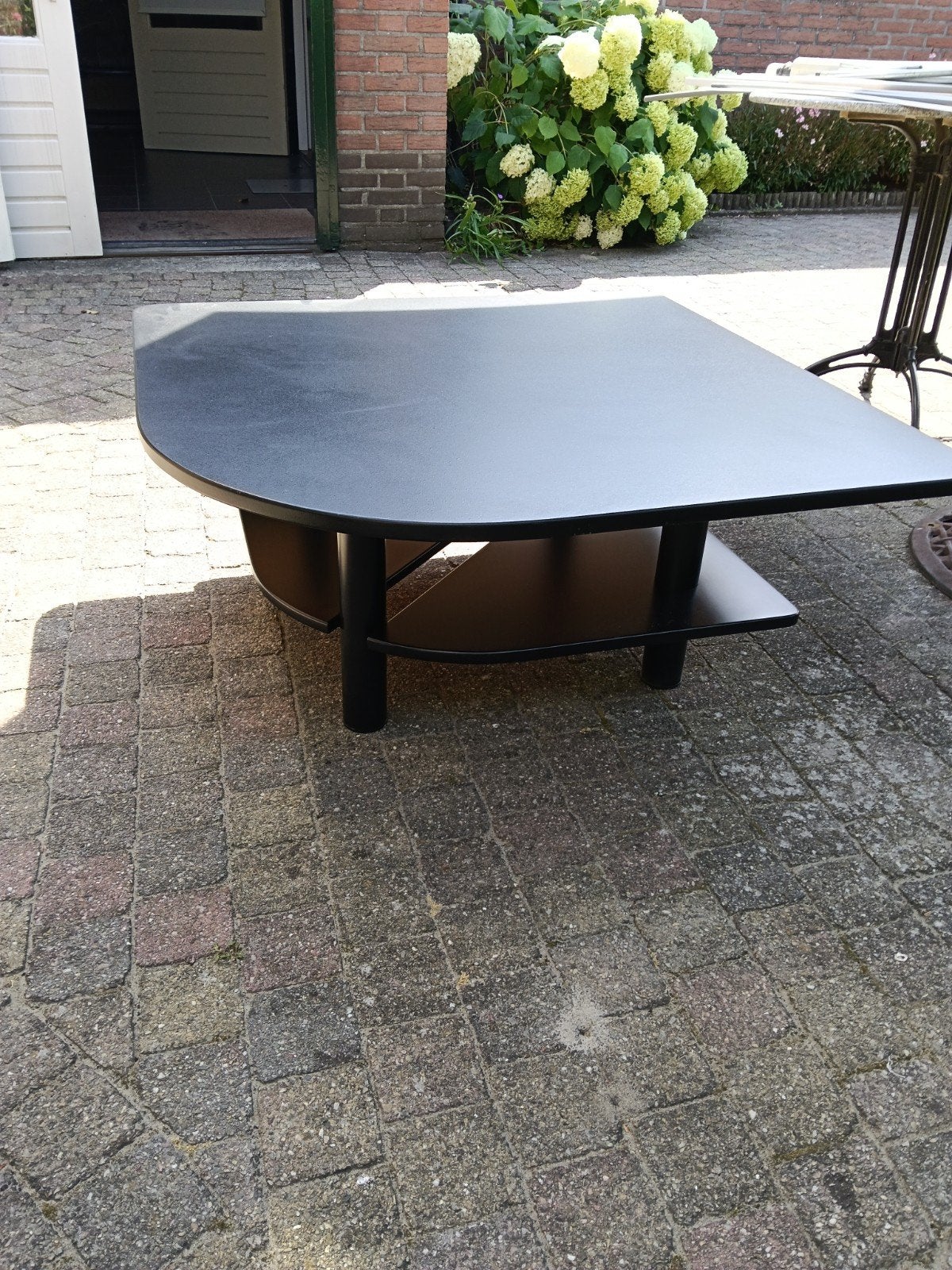 Zwarte salontafel met extra opbergruimte, Ophalen