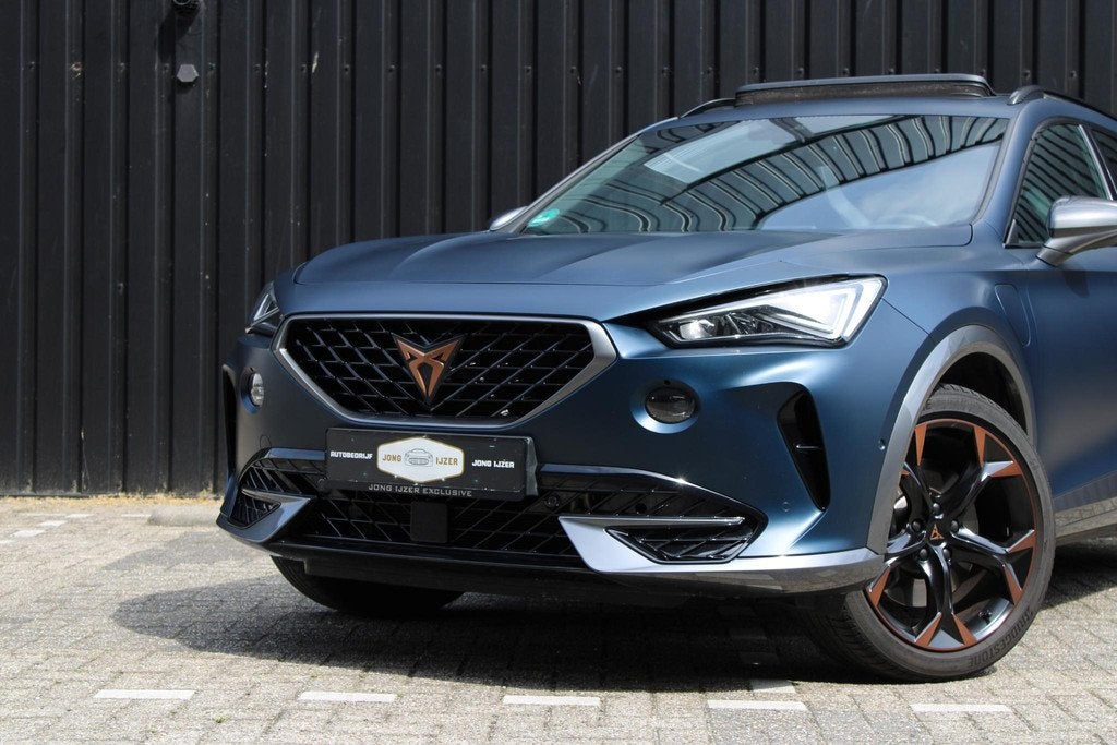 CUPRA Formentor 1.4 e-Hybrid VZ Copper PANO LEER MEMORY TREK, Auto's, Gebruikt, 4 cilinders, Formentor, Blauw