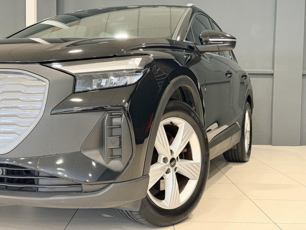 Audi Q4 e-tron 35 Launch edition 55 kWh | SOH 91,26% | Navig, Auto's, Audi, Automaat, Gebruikt, Zwart, 1865 kg