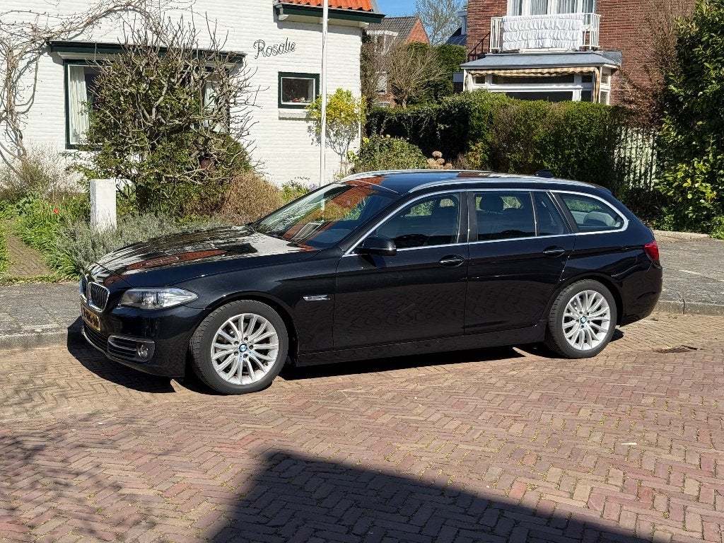 BMW 5-Serie 2.0 520I AUT 184 PK Sedan 2014 Zwart, 4 cilinders, 2000 kg, Zwart, Stationwagon