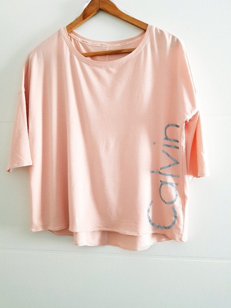 Calvin Klein Performance T-shirt - zalmkleur met logo, Maat 38/40 (M), Overige kleuren, Nieuw, Ophalen of Verzenden