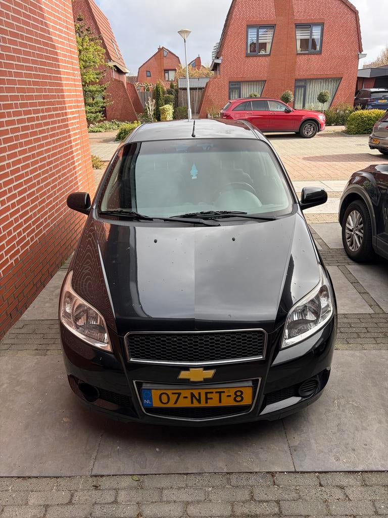 Chevrolet Aveo 1.2 16V 5D 62KW 2010 Zwart, Auto's, Chevrolet, Voorwielaandrijving, 40 €/maand, Aveo, 4 cilinders