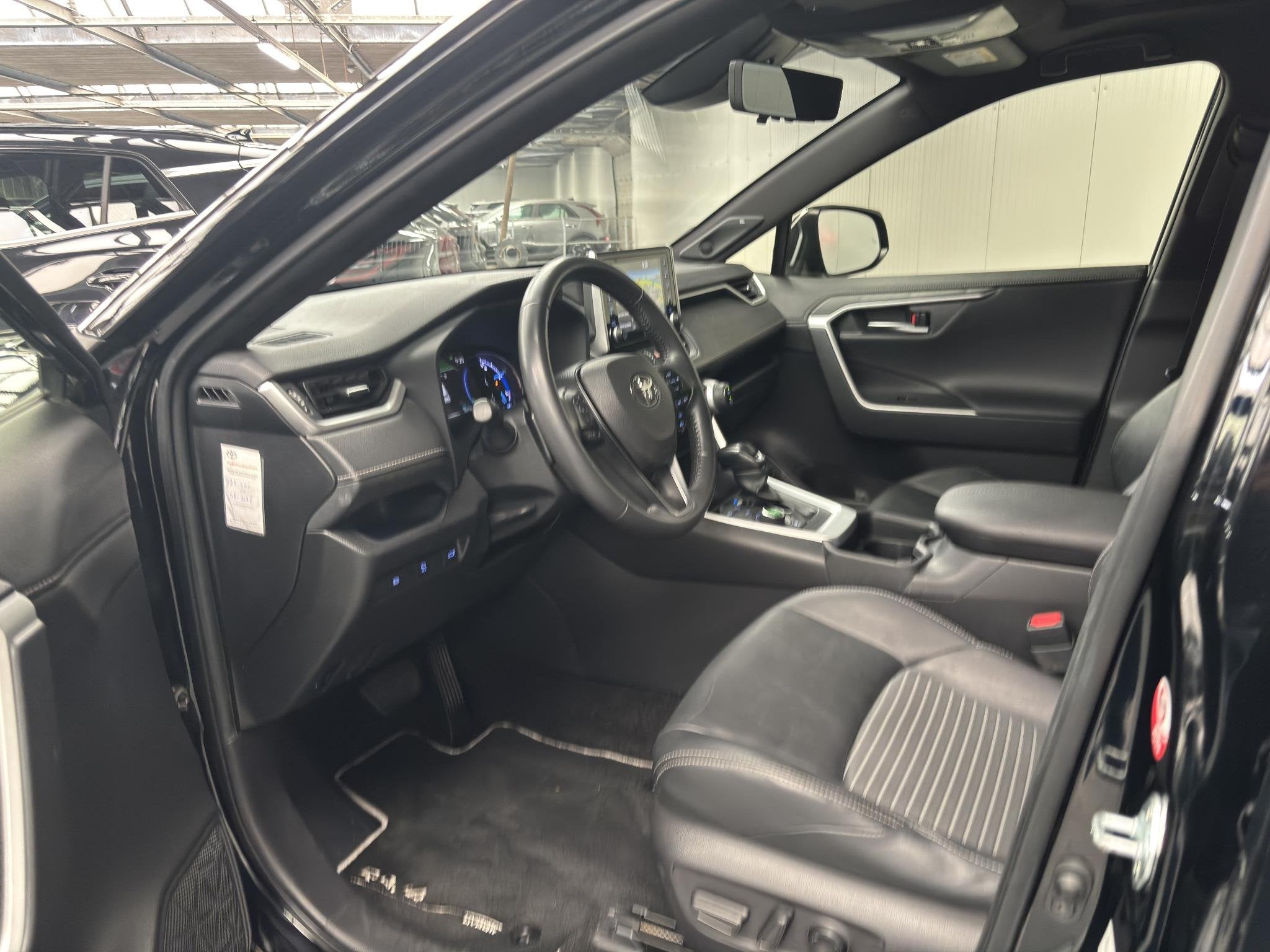 Toyota RAV4 2.5 Hybrid AWD Black Edition, Auto's, Automaat, Gebruikt, Euro 6, 4 cilinders