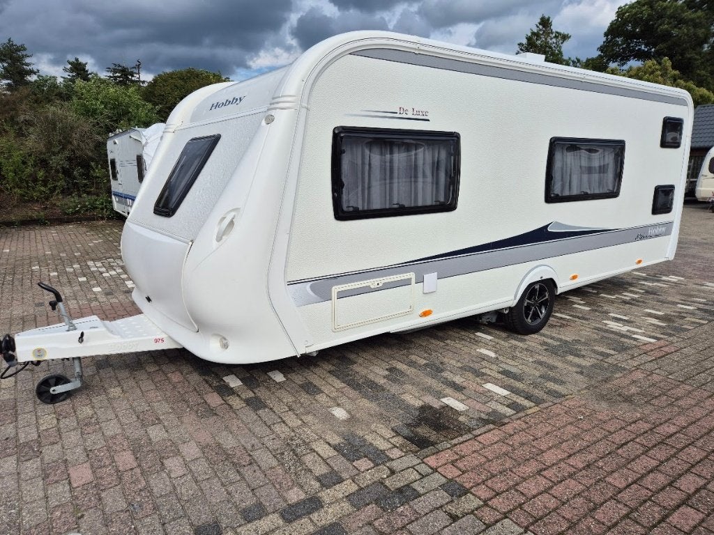 Hobby 560 KMFE bj 2011 Vol opties !!!!, Caravans en Kamperen, Caravans, Kachel, Rondzit, Hobby, Bedrijf