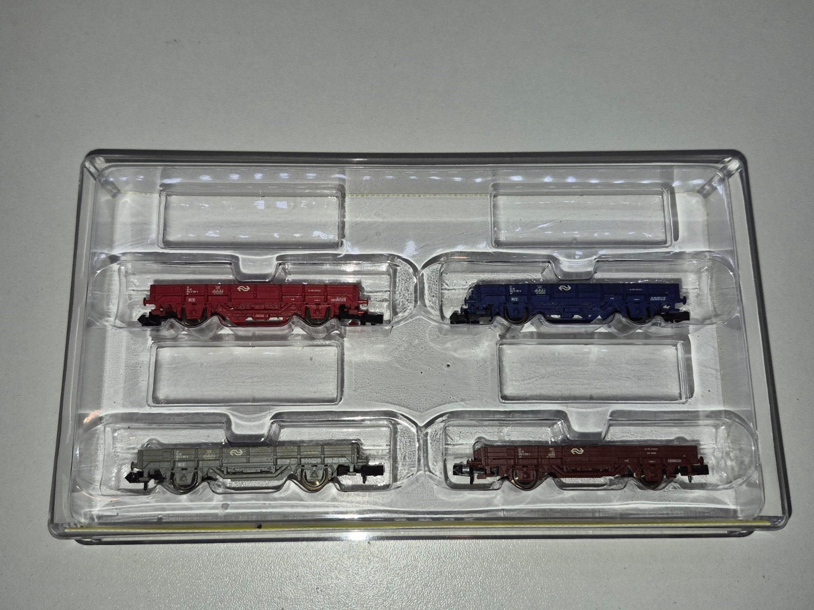 set van 4 NS platte bak wagonnen minitrix 15628, Gelijkstroom, Trix, Wagon, Ophalen of Verzenden