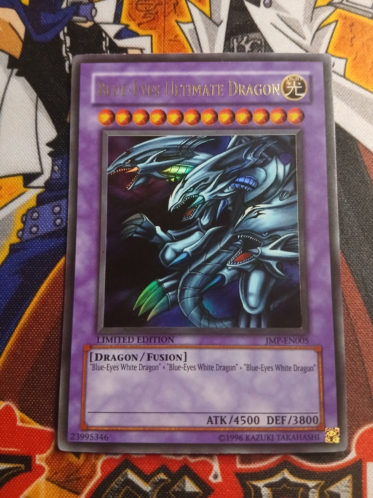 Blue-Eyes Ultimate Dragon - Ultra Rare Shonen JUMP Promo YGO, Hobby en Vrije tijd, Ophalen, Zo goed als nieuw, Foil