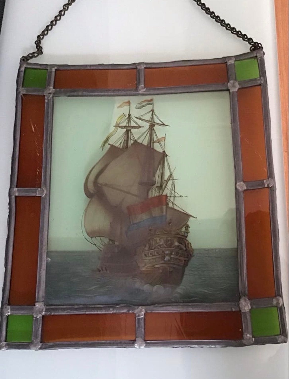 Glas in lood hanger van VOC schip, Ophalen