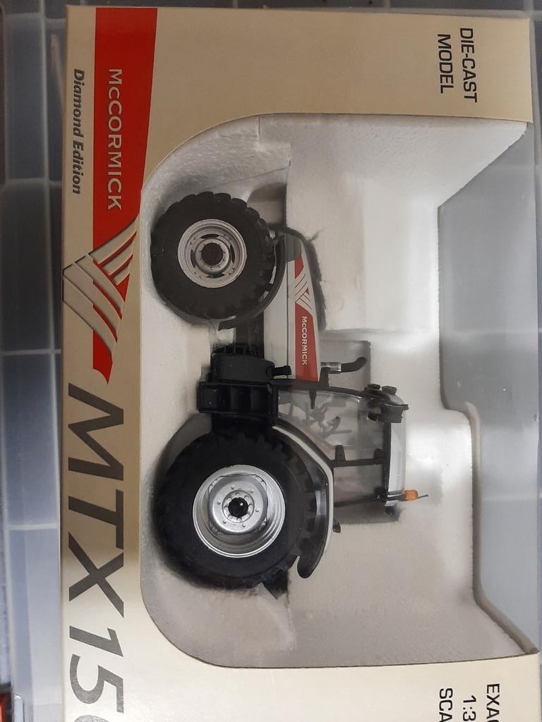Mc Cormick MTX 150. UH schaal 1:32., Hobby en Vrije tijd, Modelauto's | 1:32, Ophalen of Verzenden, Nieuw, Tractor of Landbouw