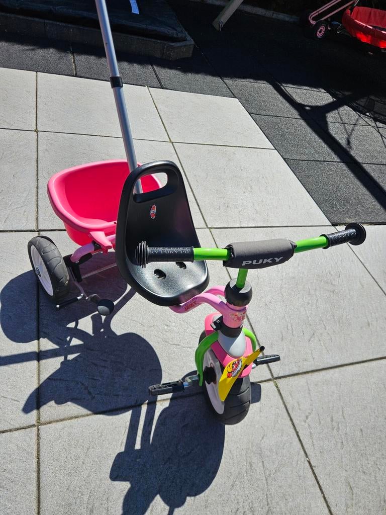 Mooie puky driewieler met duwstang roze groen, Ophalen, Gebruikt