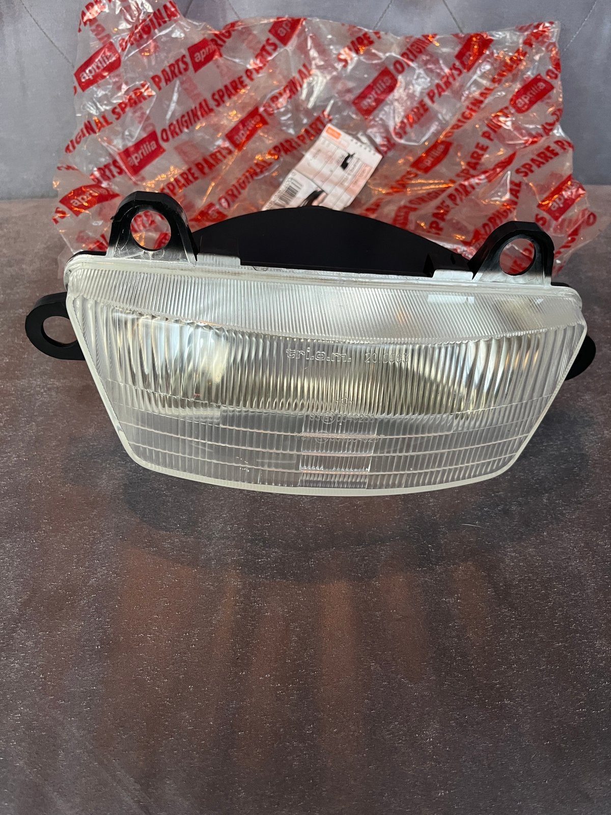 NOS Aprilia AF1 50 Futura en 1e RS50 koplamp, Ophalen of Verzenden, Zo goed als nieuw, Koplamp