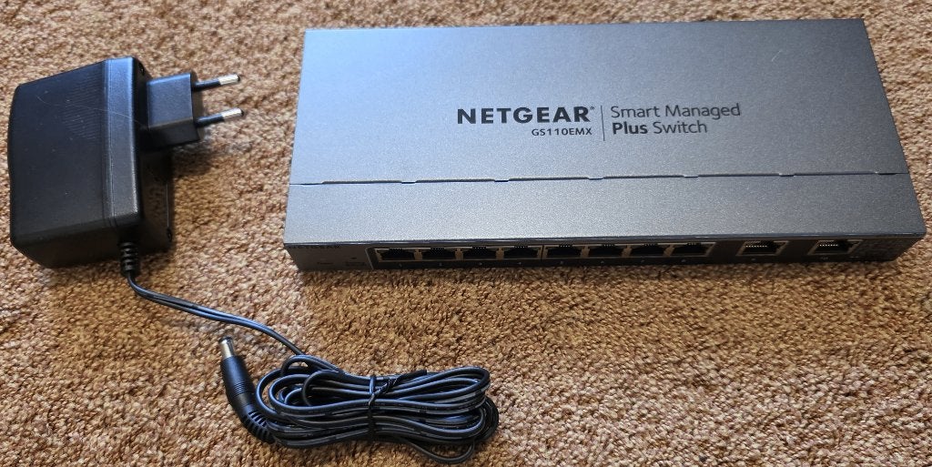 Netgear GS110EMX Smart Managed Plus Switch, Ophalen of Verzenden, Gebruikt, Toebehoren