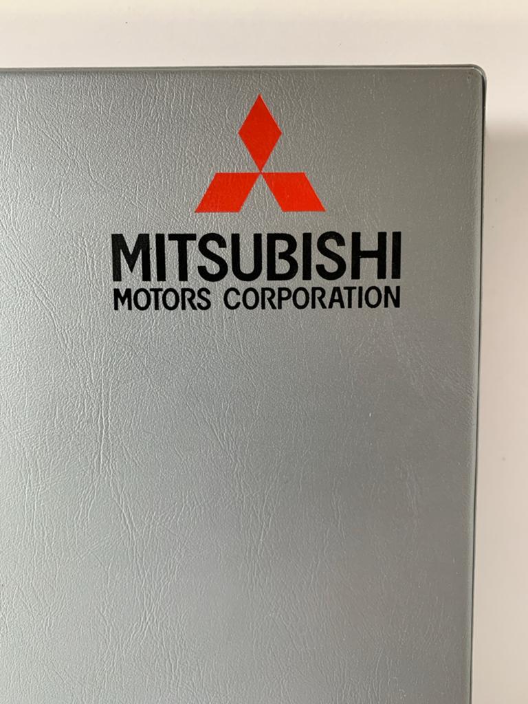 Oude Mitsubishi multimap klapper zilverkleur 4-rings, Ophalen of Verzenden, Gebruikt, Auto's