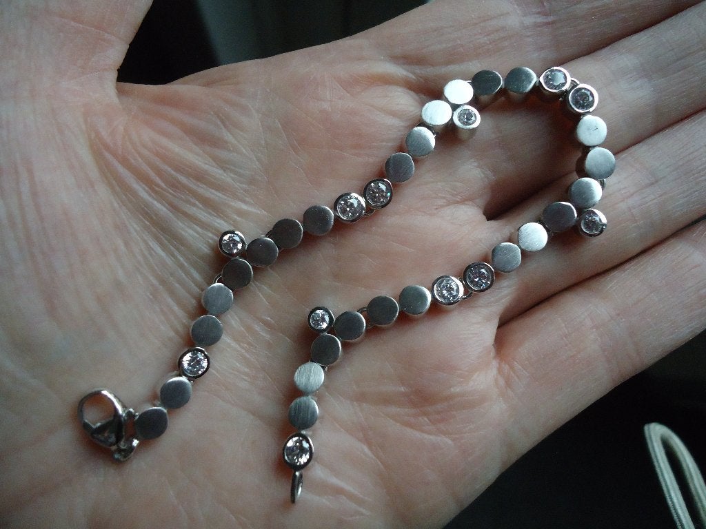 mooie echt zilveren armband van pierre cardin 925 nieuwstaat, Met kristal, Ophalen of Verzenden, Zo goed als nieuw, Zilver