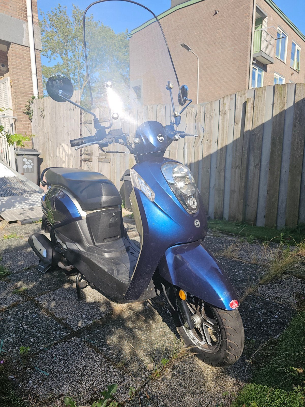 Sym Mio 4t bouwjaar 2019, Ophalen of Verzenden, Zo goed als nieuw, Benzine, Mio