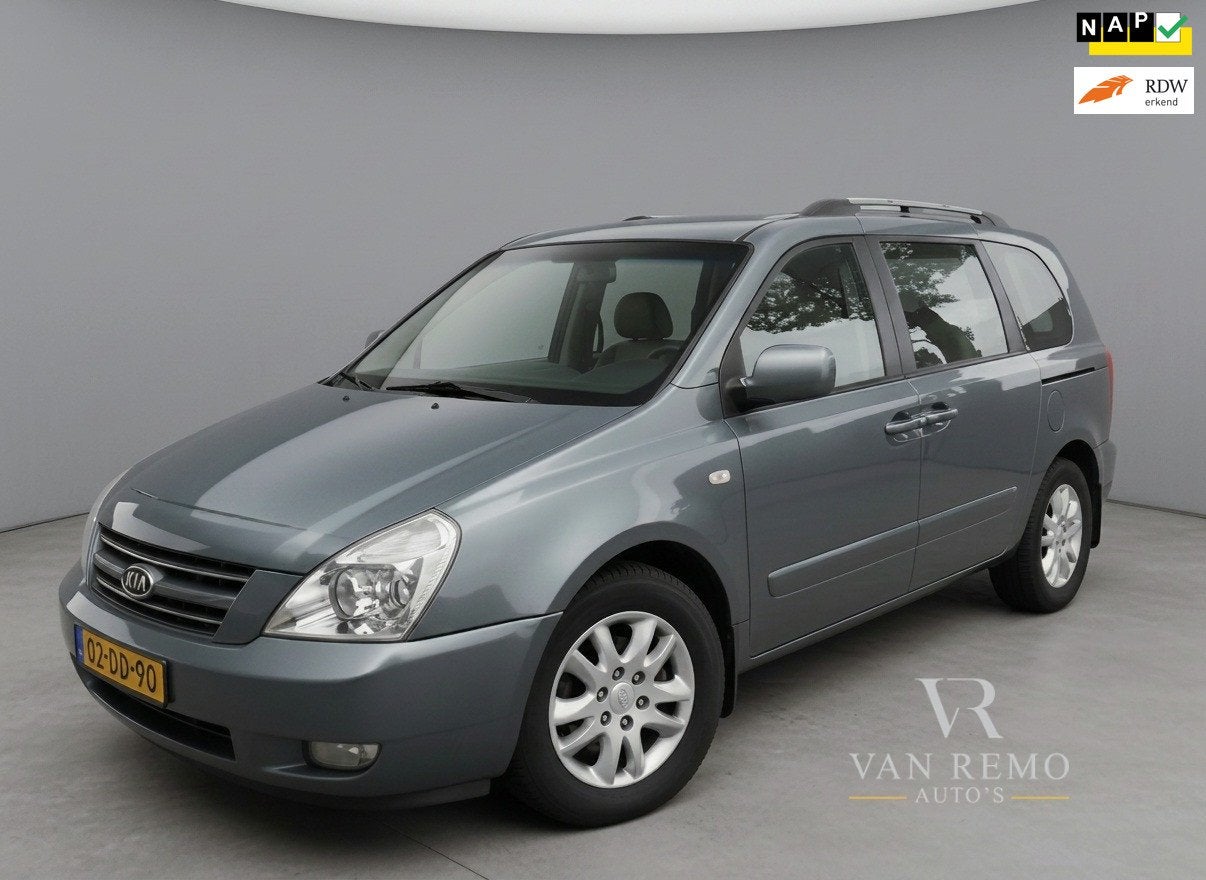 Kia Carnival 2.7 EX Automaat|Clima|Cruise|Leder|7P|Nap!, Auto's, Gebruikt, Stoelverwarming, 2000 kg, 120 €/maand