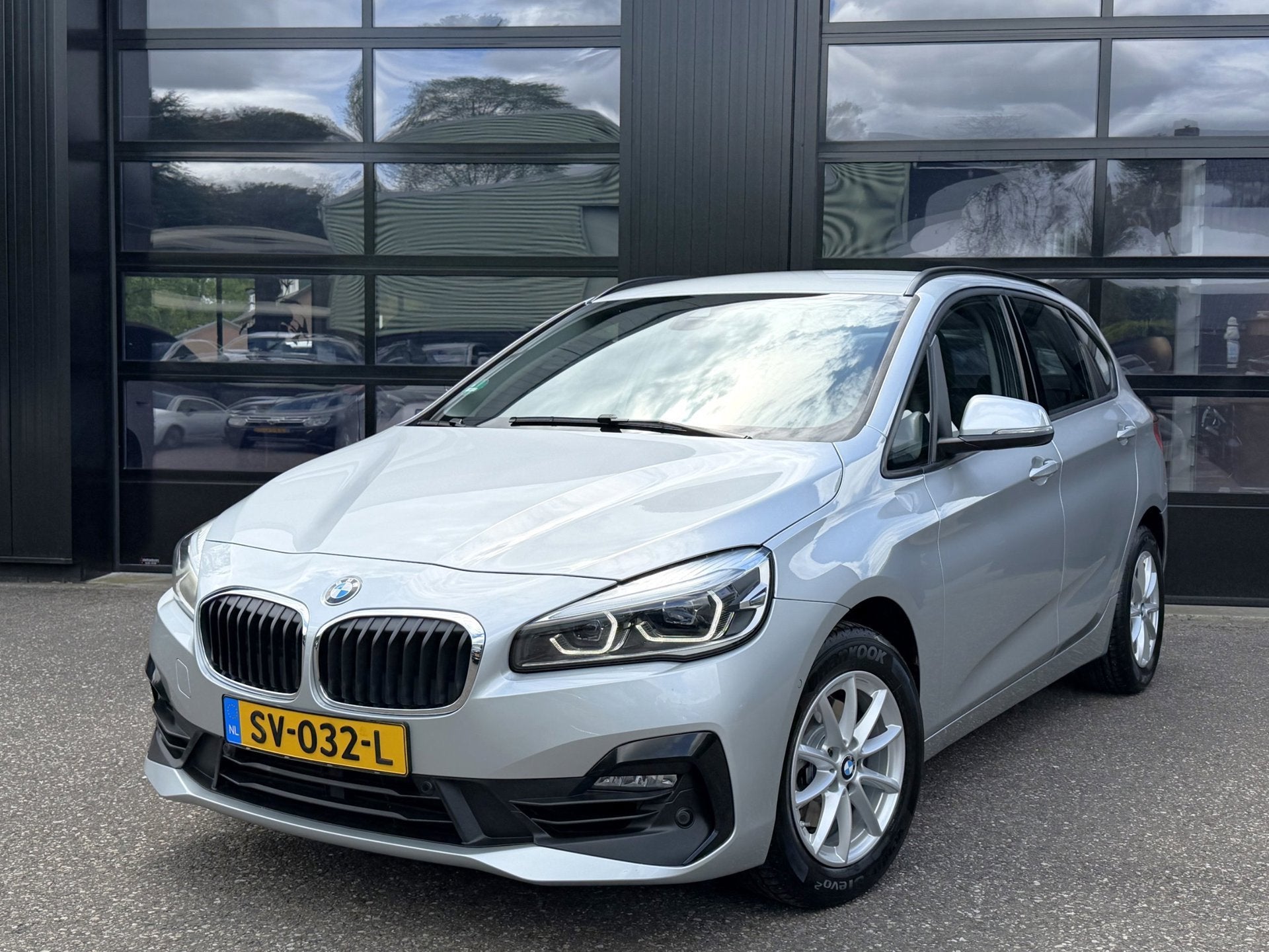 BMW 2-Serie Active Tourer 218i Sportline Camera Facelift, Auto's, BMW, Stof, Gebruikt, Euro 6, Origineel Nederlands
