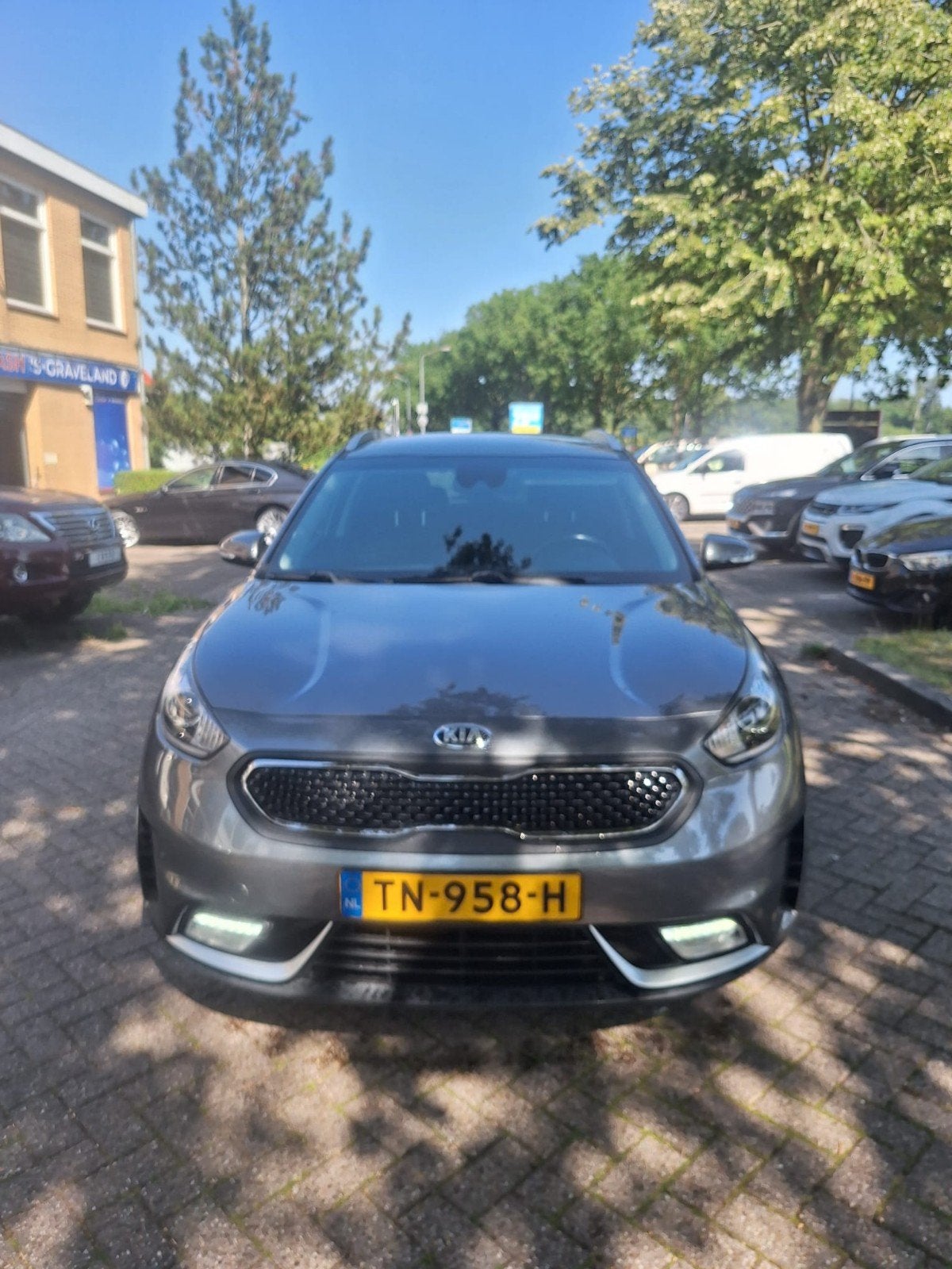 Kia Niro 1.6 GDi Hybrid 141pk Dct6 2018 Grijs, Auto's, Euro 5, Leder en Stof, Origineel Nederlands, 75 €/maand