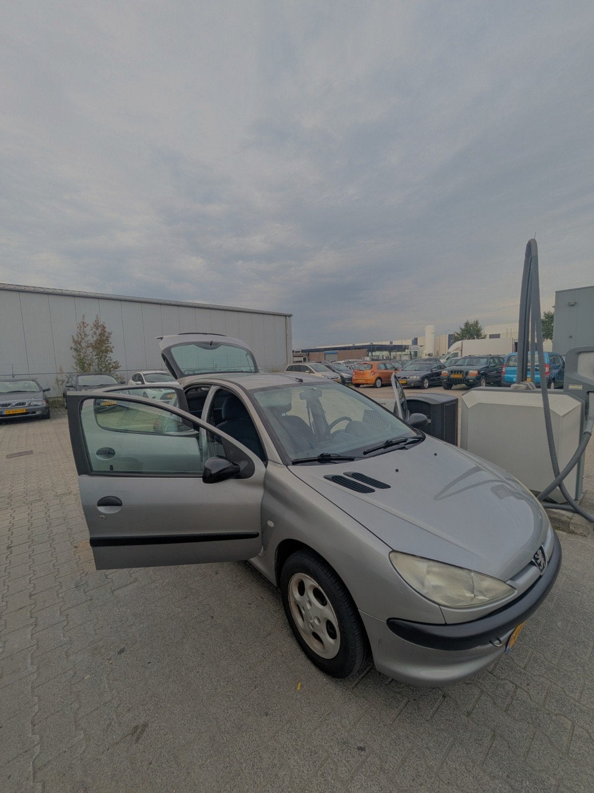 Peugeot 206, Auto's, Voorwielaandrijving, 4 cilinders, Metallic lak, Leder en Stof