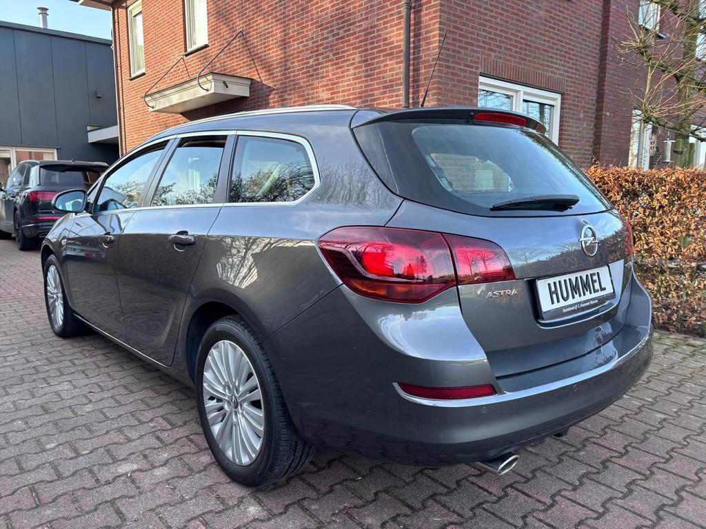 Opel Astra Sports Tourer 1.4 Turbo Cosmo, Auto's, Opel, Voorwielaandrijving, Gebruikt, Zwart, 4 cilinders