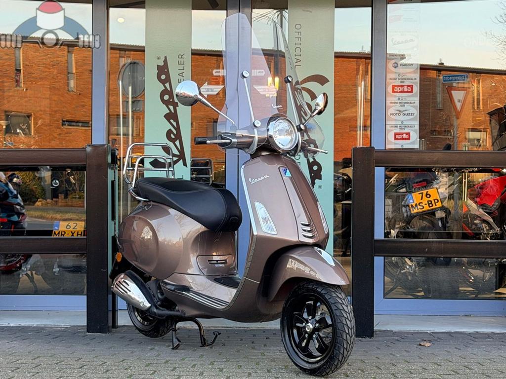Vespa Primavera Marone bruin 1946 km 09-2014 1e eig. 25km, Fietsen en Brommers, Scooters | Vespa, Ophalen, Overige modellen, Onbekend