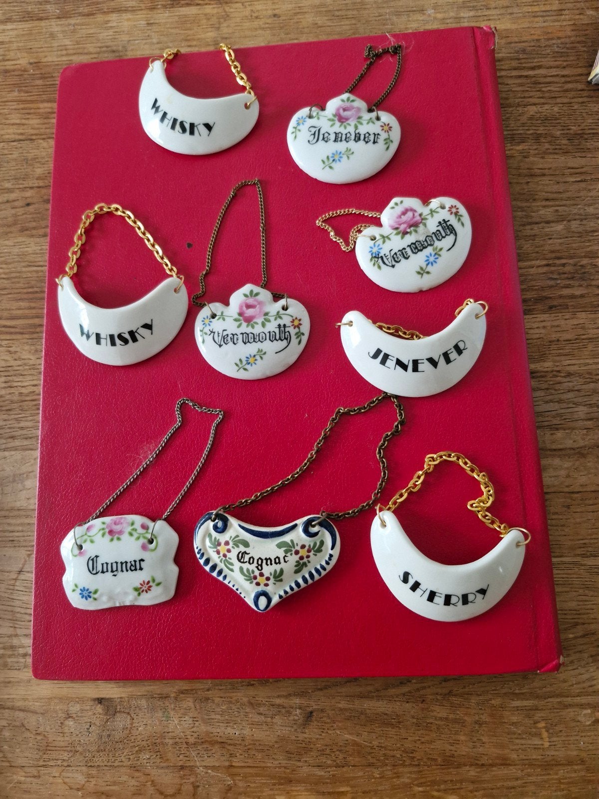 Set van 9 Vintage Porseleinen Dranketiketten, Ophalen of Verzenden
