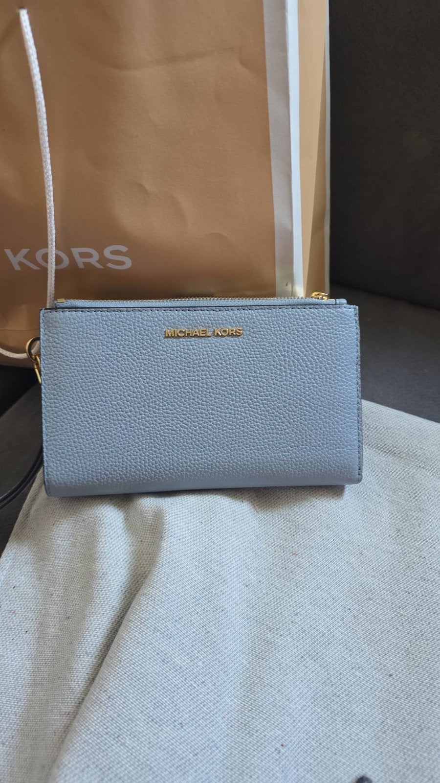 Michael Kors portemonnee/telefoonhouder lichtblauw, Sieraden, Tassen en Uiterlijk, Portemonnees, Ophalen of Verzenden, Zo goed als nieuw