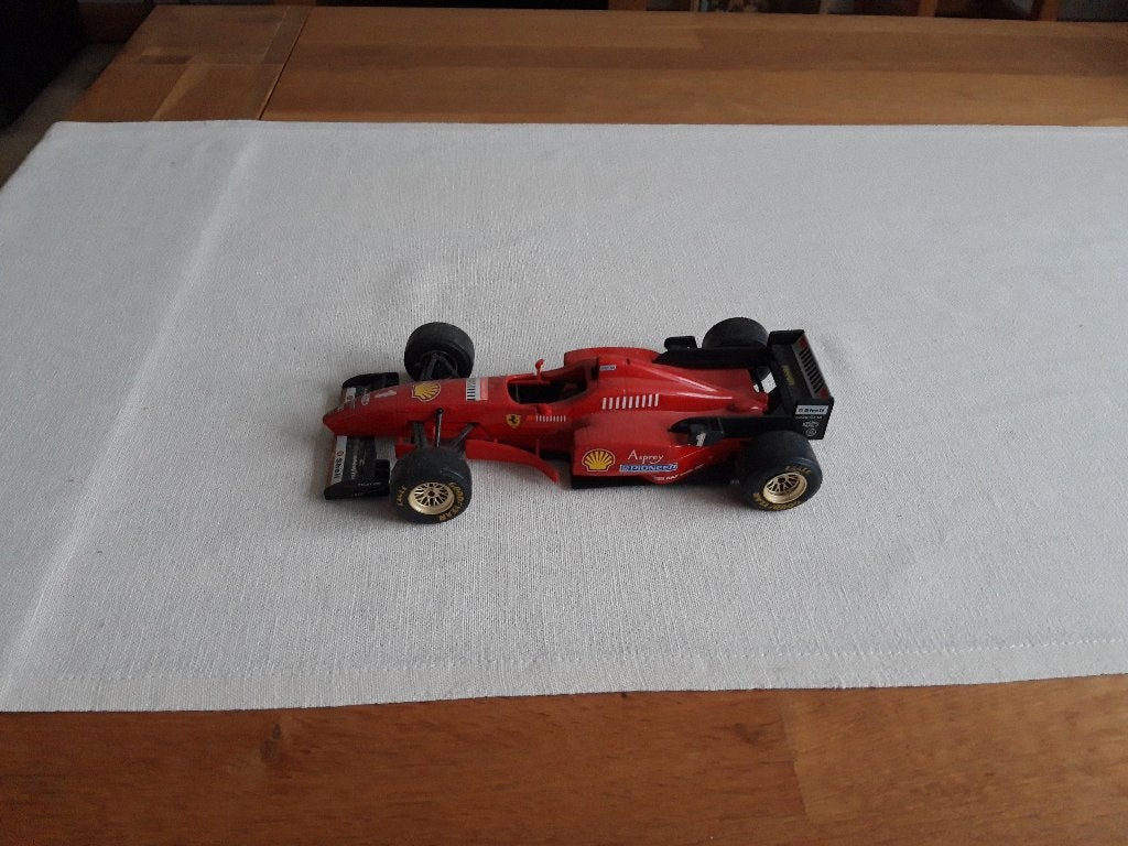 Bburago Formule 1 Ferrari F310  nr. 1 Michael Schumacher, Ophalen of Verzenden, Gebruikt, Formule 1