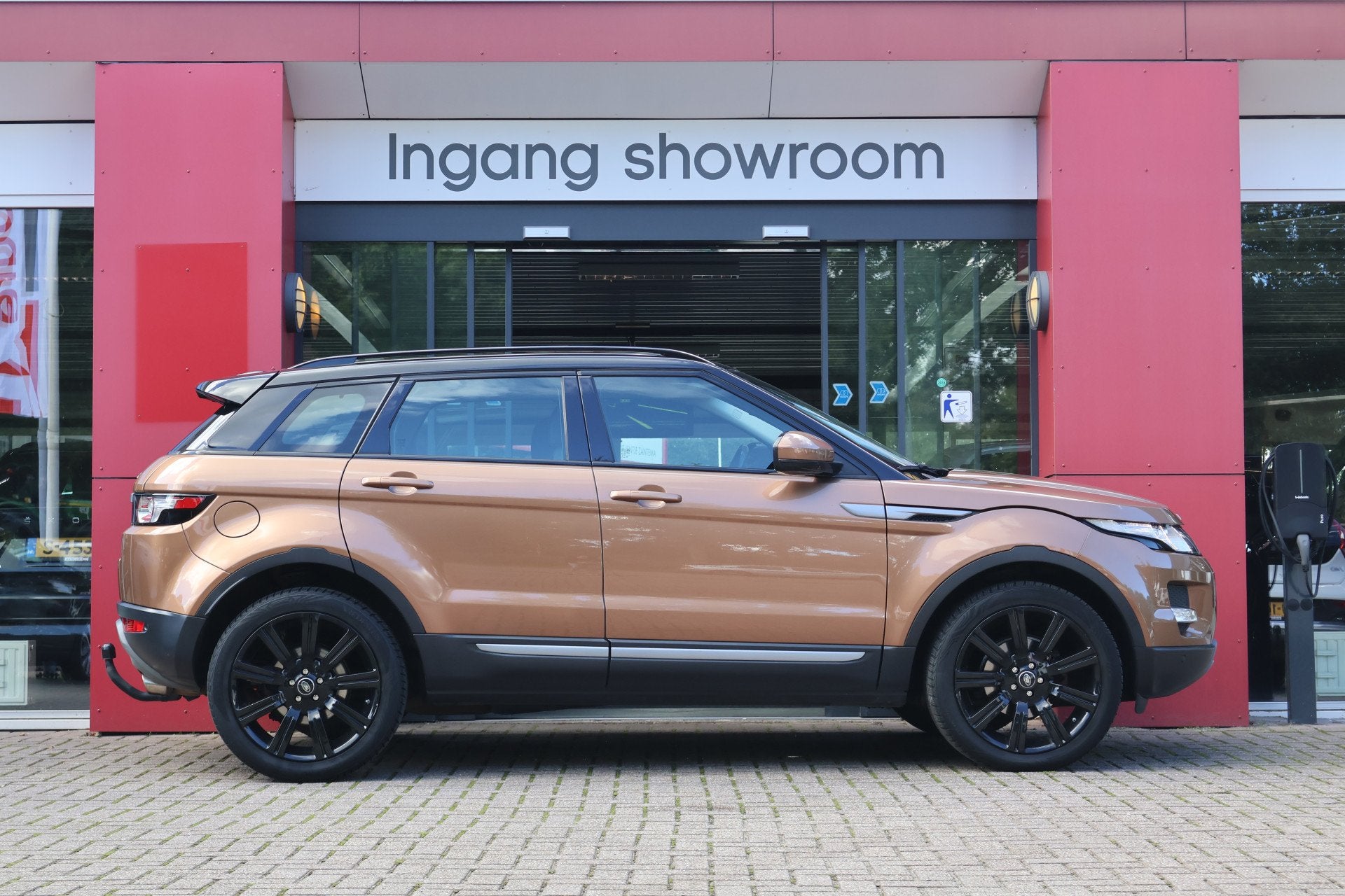 Land Rover Range Rover Evoque 2.0 Si 4WD Sicilian Yellow | S, Auto's, Automaat, Euro 5, Zwart, 4 cilinders