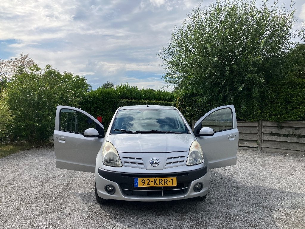 Nissan Pixo 1.0 50KW 5D 2010 Grijs, Auto's, Nissan, Voorwielaandrijving, Stof, 4 stoelen, Origineel Nederlands