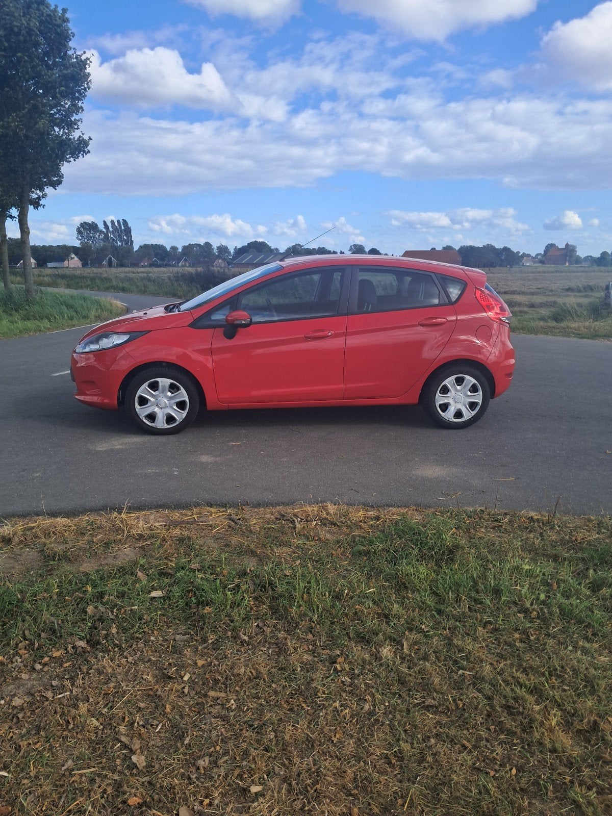 Ford Fiësta 1.25 44KW 5DR 2011 Rood, Auto's, Ford, Voorwielaandrijving, 40 €/maand, 1242 cc, 4 cilinders