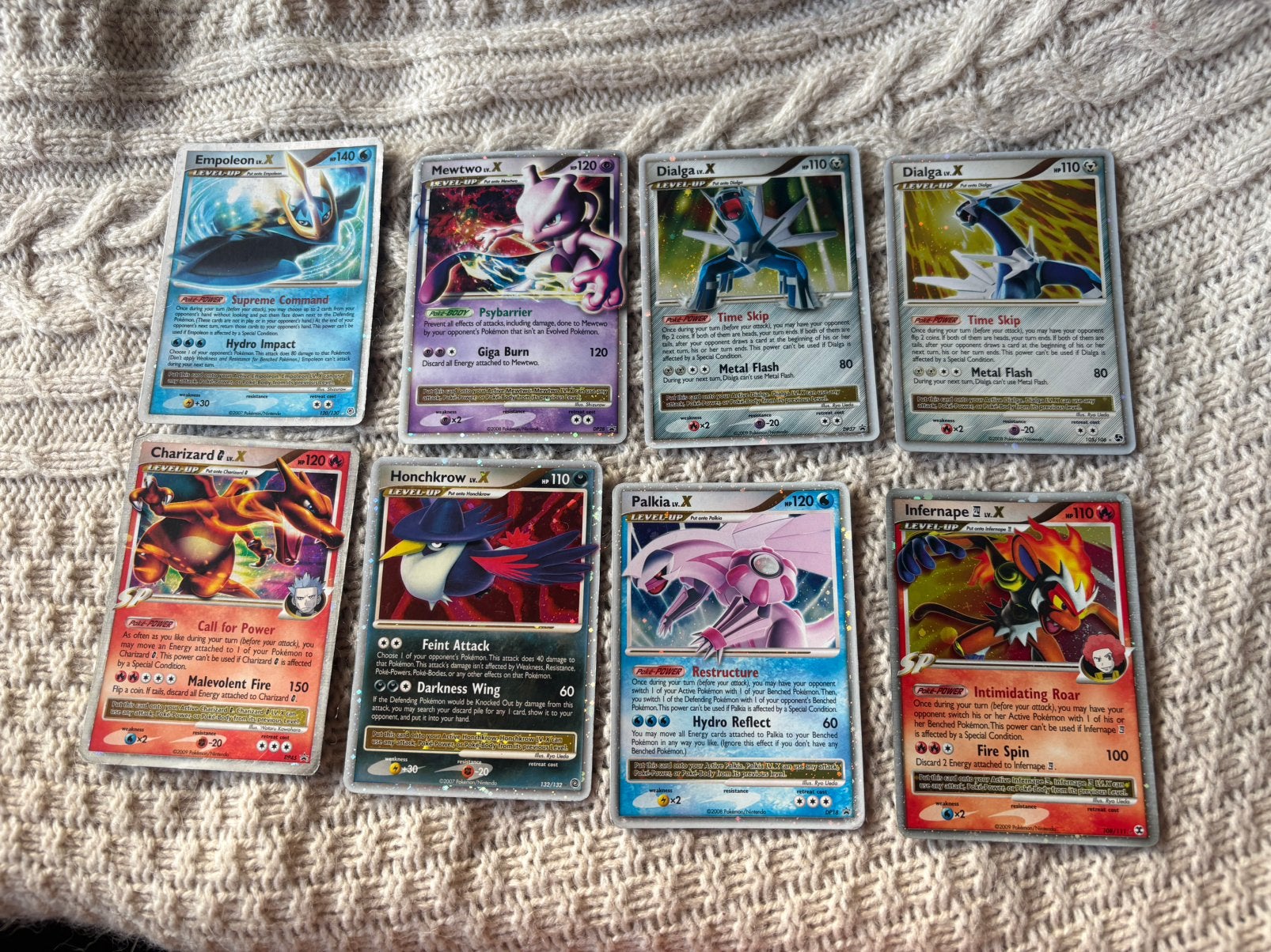8 pokemon kaarten lv X 2007-2009 charizard mewtwo dialga, Ophalen of Verzenden, Zo goed als nieuw, Meerdere kaarten