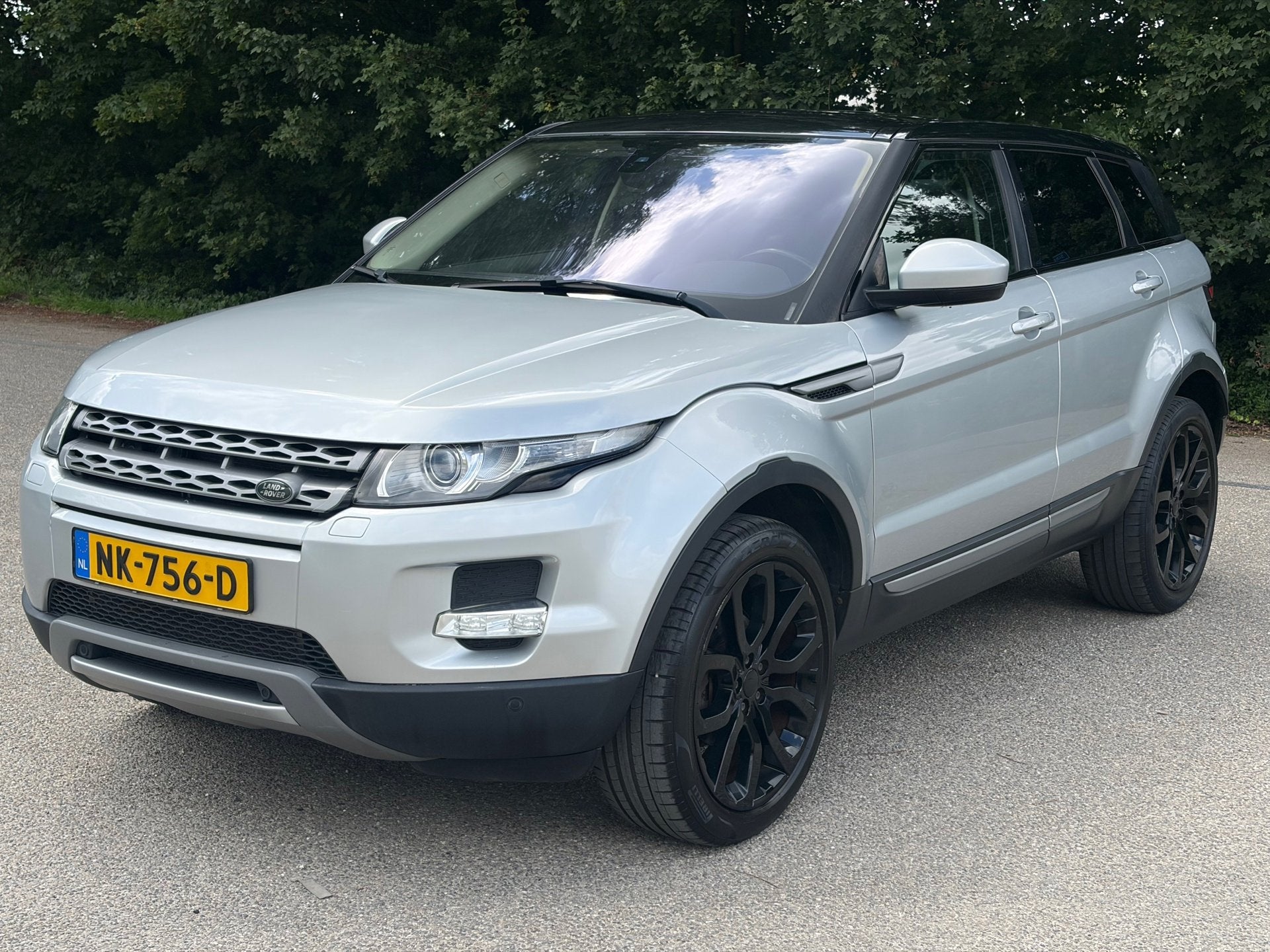 Land Rover Range Rover Evoque 2.0 Si 4WD Sicilian Yellow, Auto's, Land Rover, Automaat, Euro 5, Zwart, 4 cilinders