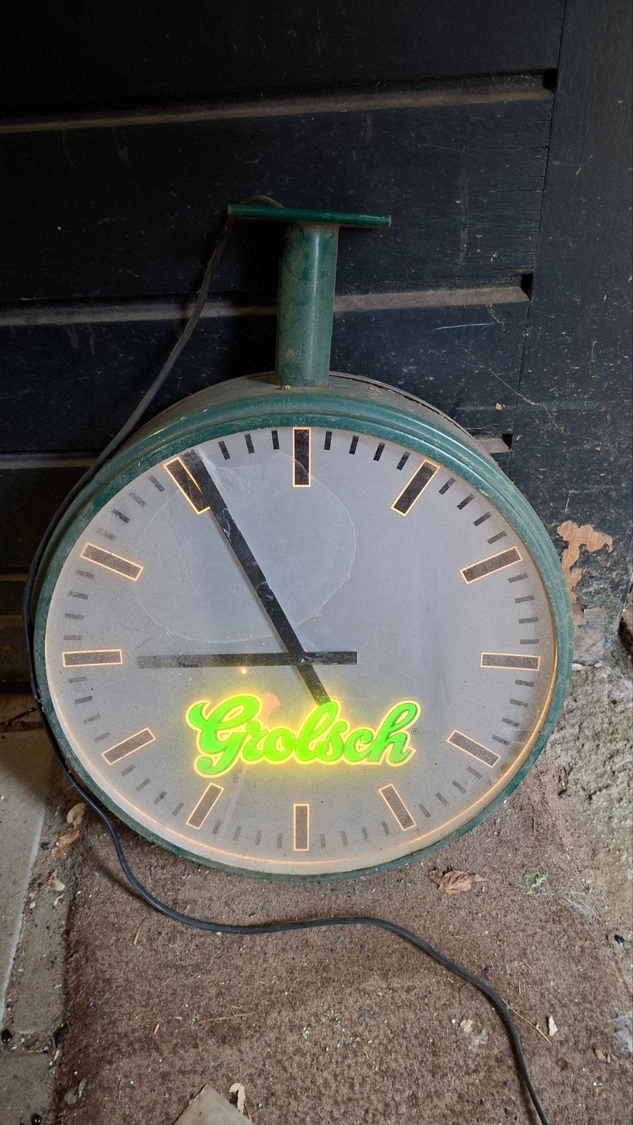 Grolsch Lichtreclame Klok en Reclamebord, Ophalen