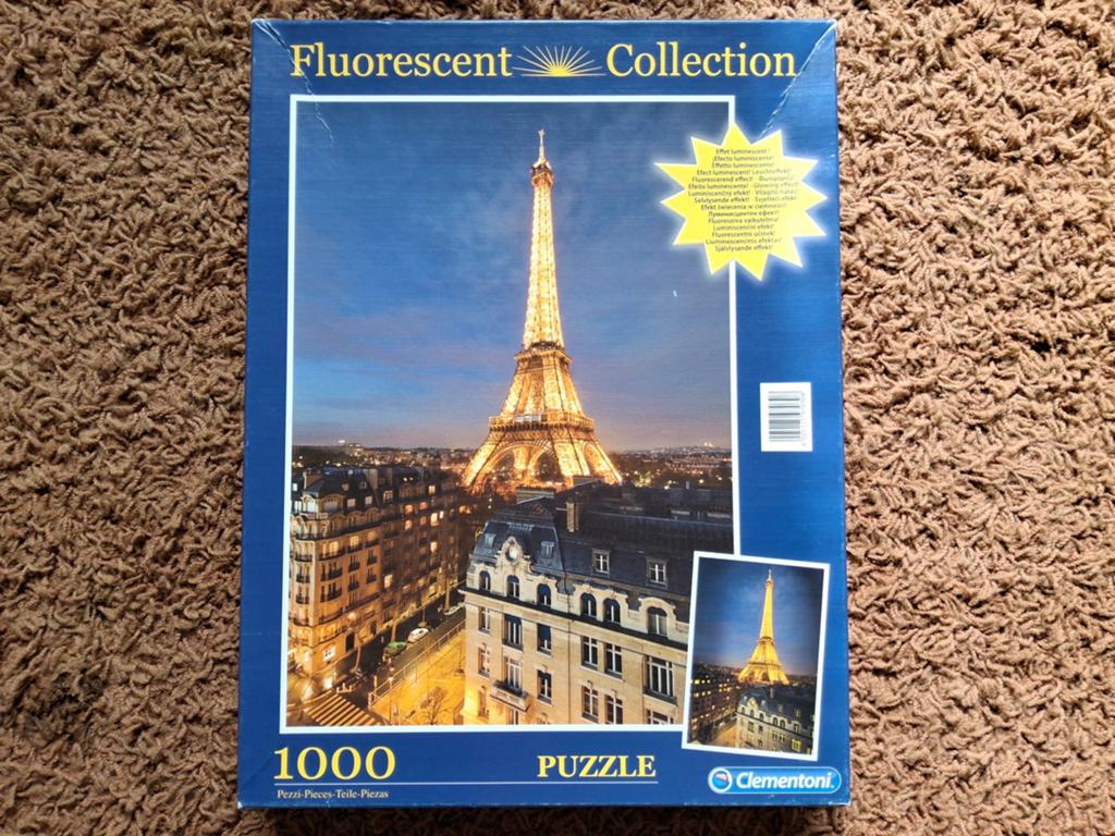 Eiffeltoren Puzzel 1000 Stukjes - Fluorescerend, Ophalen of Verzenden, 500 t/m 1500 stukjes, Zo goed als nieuw, Legpuzzel
