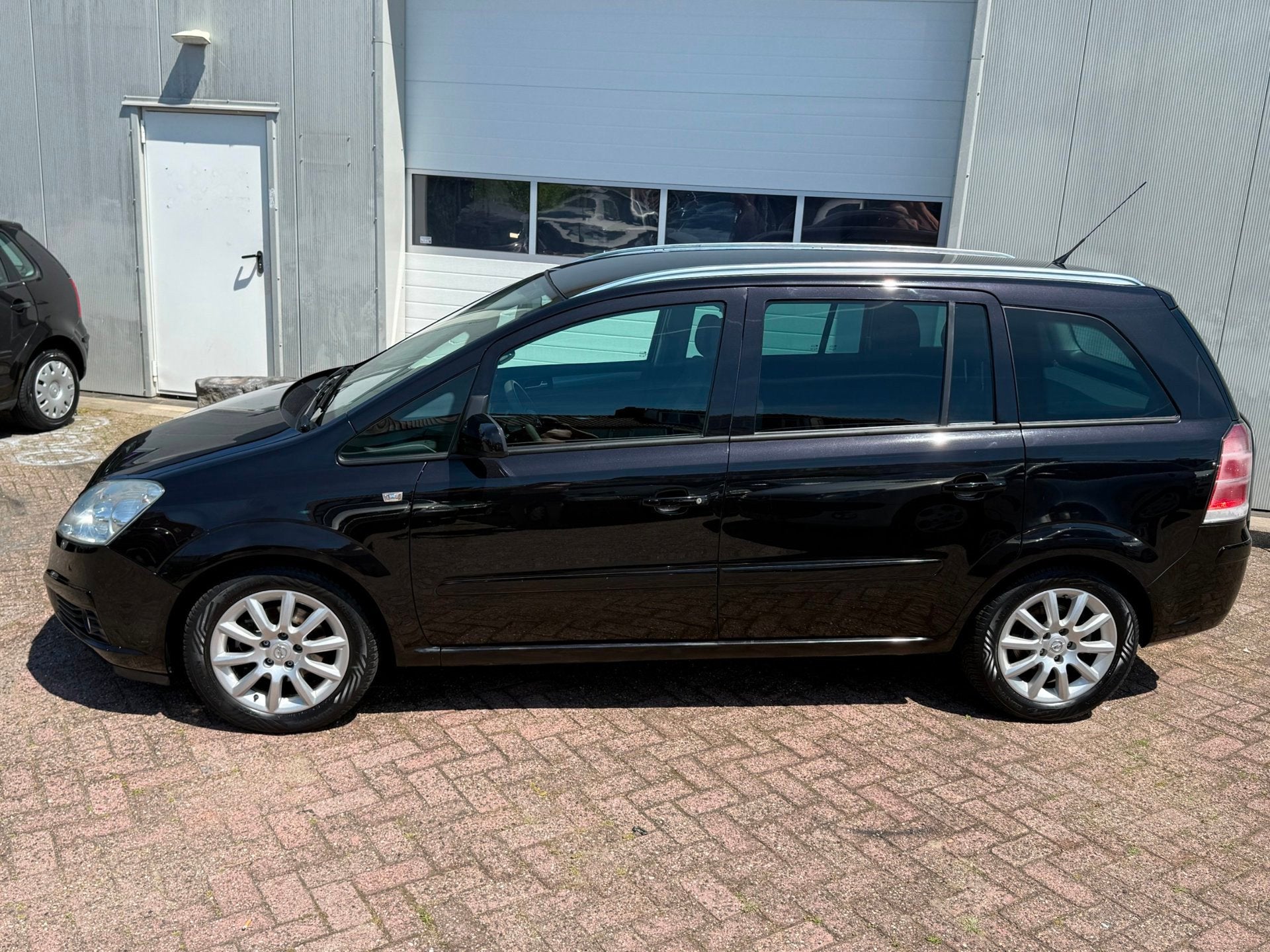 Opel Zafira 1.8 Temptation, Auto's, Gebruikt, 4 cilinders, Zwart, Origineel Nederlands