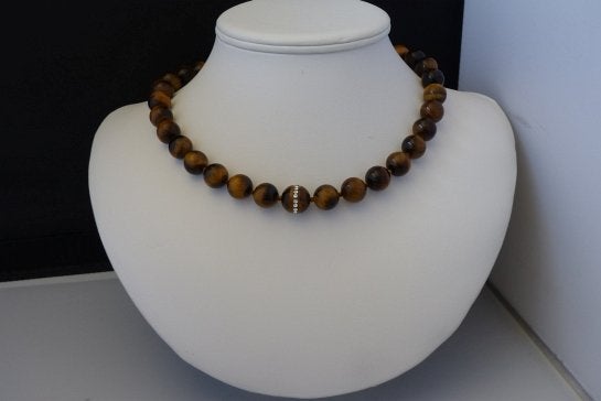 TIJGEROOG ketting/armband-set, Verzenden, Nieuw, Bruin, Zilver