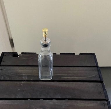 Olieflesje, Overige typen, Ophalen of Verzenden, Gebruikt, Glas