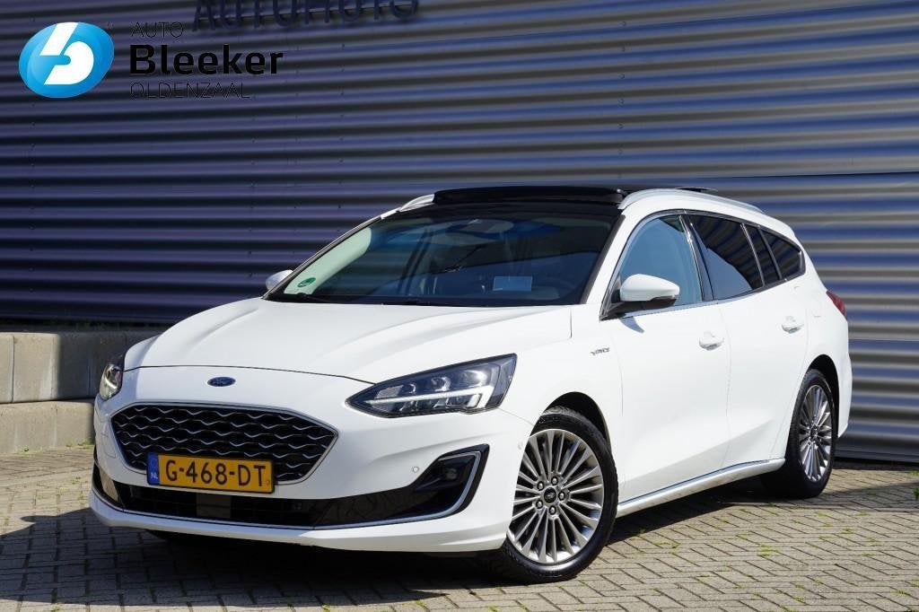 Ford Focus Wagon 1.0 125PK Vignale Ecc Adapt.Cruise Pano Lee, Auto's, 125 pk, Gebruikt, Lichtsensor, 1283 kg