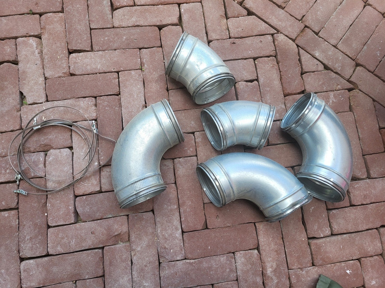 Spiraliet bochten 125mm - 5 stuks met klemband, Doe-het-zelf en Verbouw, Ophalen of Verzenden, Nieuw