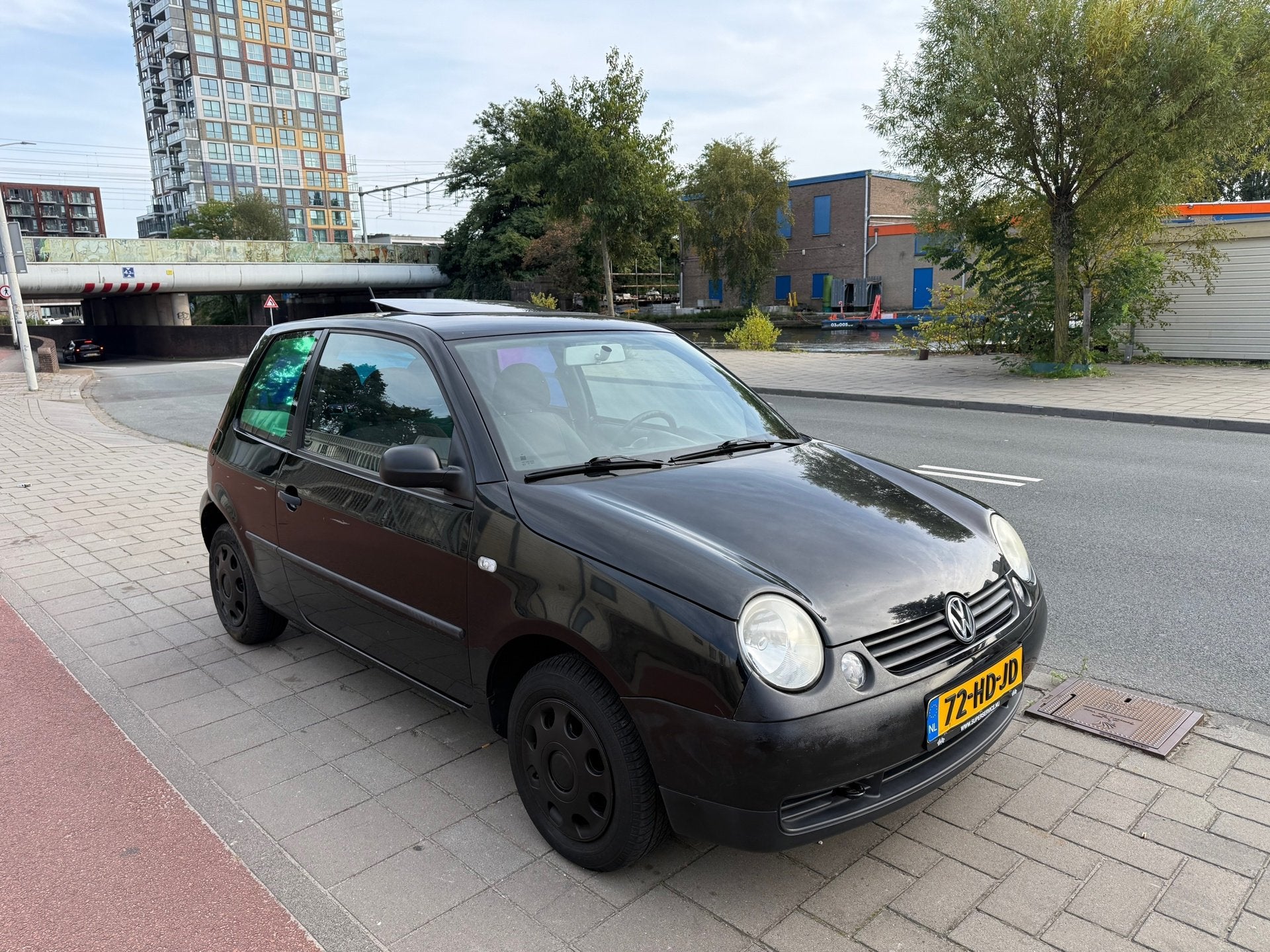 Volkswagen Lupo 1.4 Trendline N.A.P Schuifdak, Auto's, Voorwielaandrijving, Gebruikt, 4 cilinders, Zwart