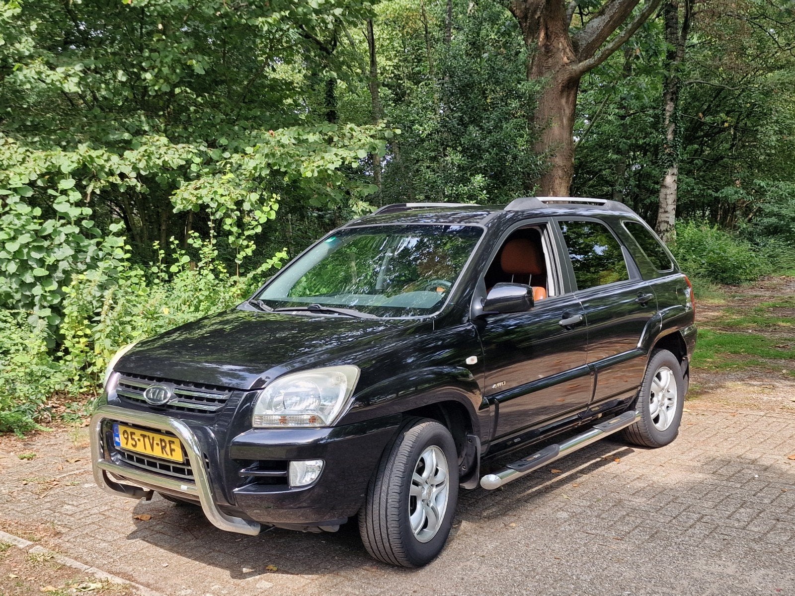 Kia Sportage 2.7 4WD AUT 2007 Zwart, Auto's, Kia, Automaat, Zwart, Vierwielaandrijving, 1570 kg