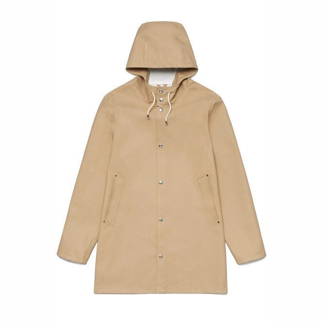 Mooie en stevige unisex Stutterheim regenjas NIEUW, L, Maat 52/54 (L), Beige, Nieuw, Ophalen of Verzenden