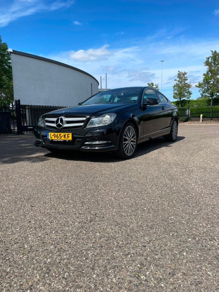Mercedes-Benz C-Klasse 1.8 C180 CGI Sportcoupe AUT 2011, Automaat, Zwart, 4 cilinders, 4 stoelen