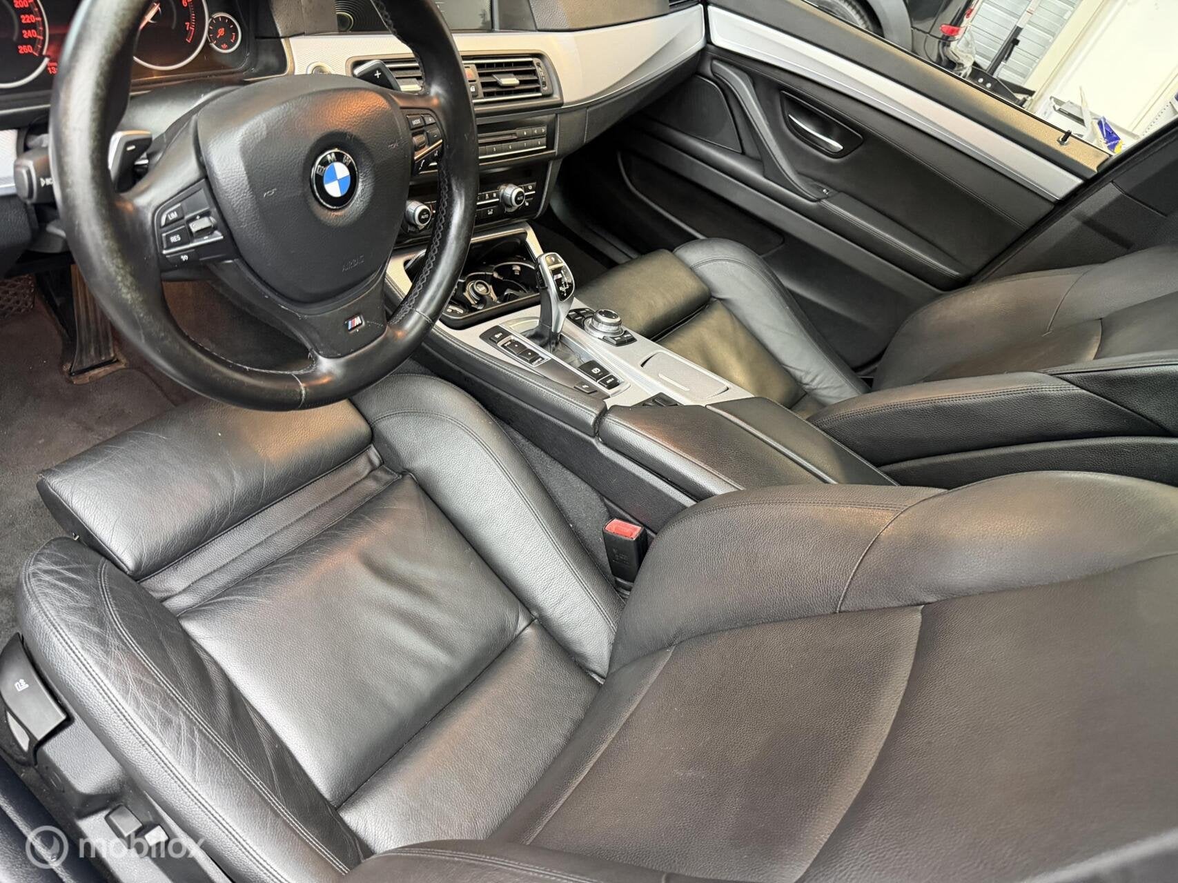 Foto 12 van BMW 5-serie Touring 520i High Executive