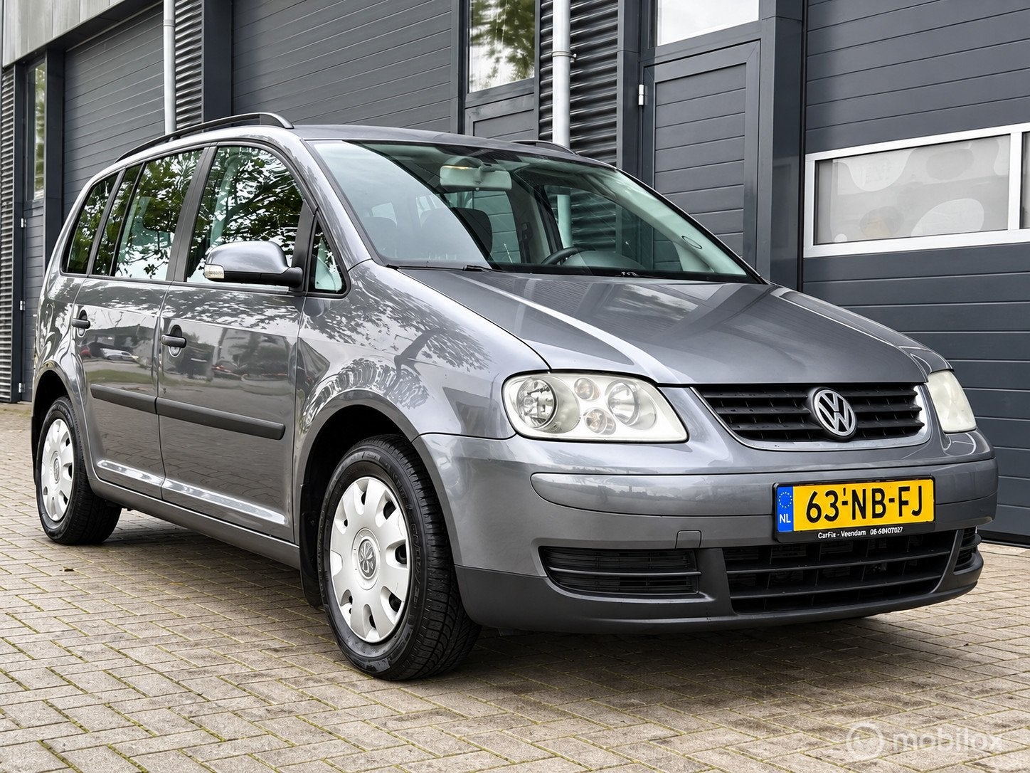 Volkswagen Touran 1.6-16V FSI | AIRCO | CRUISE | TREKHAAK, Voorwielaandrijving, Stof, Gebruikt, Zwart