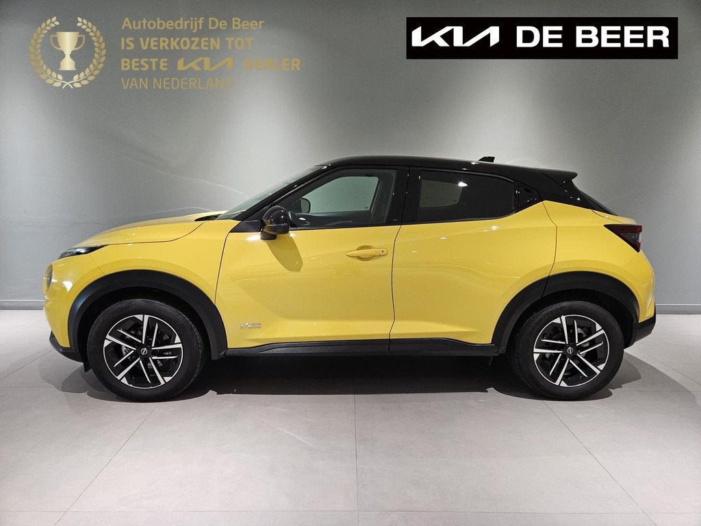 NISSAN Juke Hybrid 143pk Business Premium Navi/ Clima/ Cruis, Auto's, Stof, Gebruikt, 4 cilinders, Bedrijf