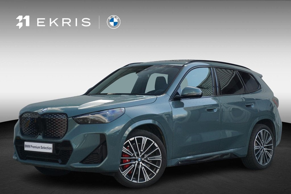 BMW iX1 eDrive20 M Sport Pro | Harman Kardon / Panoramadak /, Auto's, BMW, Bedrijf, Te koop, iX1, Alarm, Bochtverlichting, Dakrails