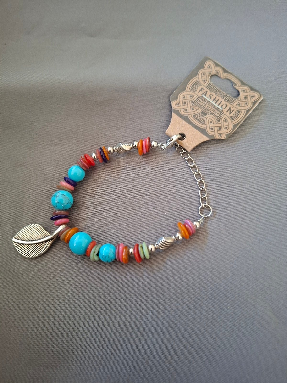 Armbandje, Ophalen of Verzenden, Nieuw, Overige materialen, Met bedels of kralen