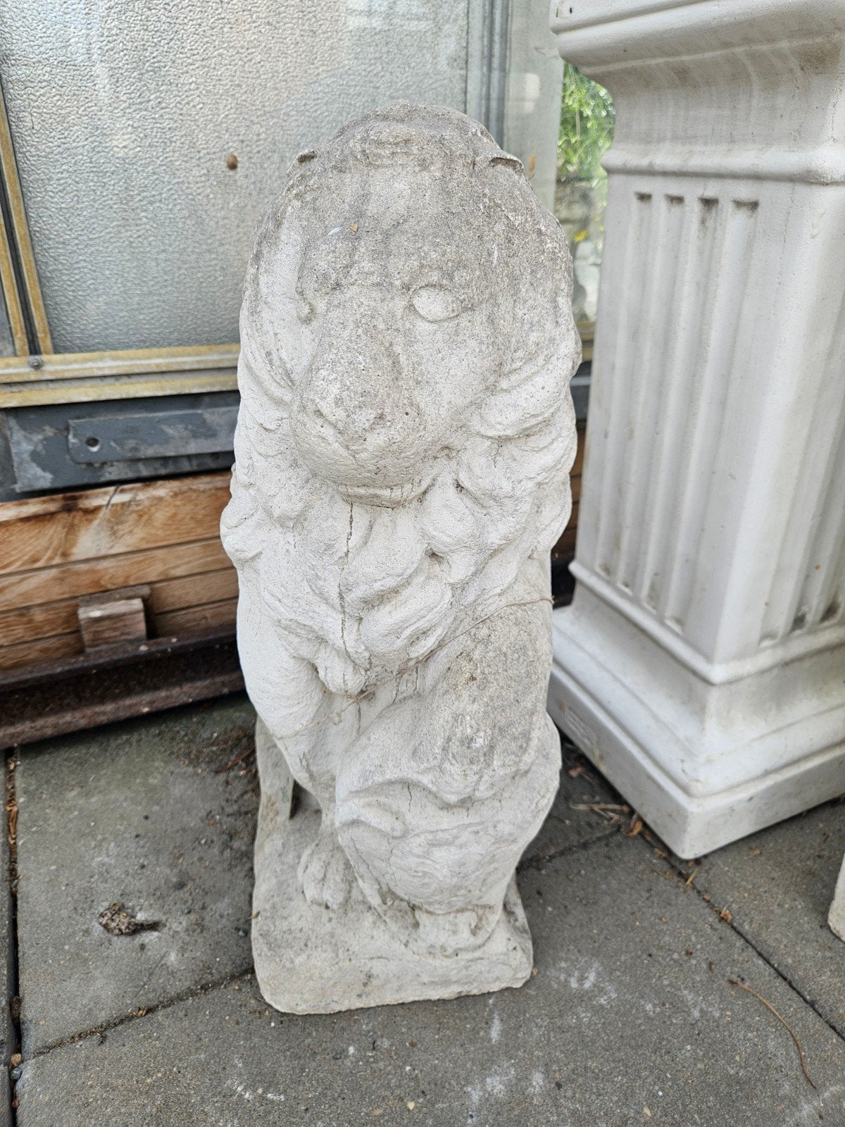 Tuinbeeld leeuw, Ophalen